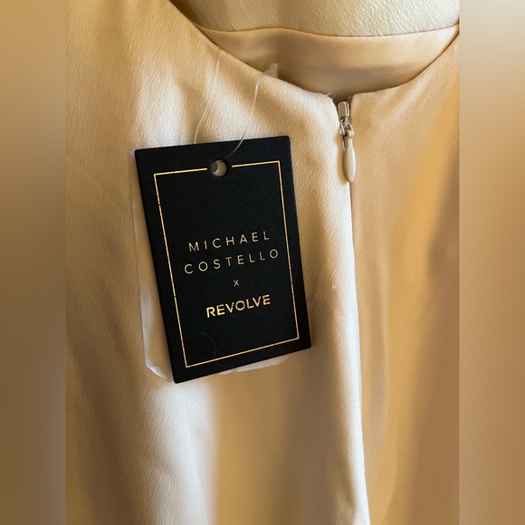 x REVOLVE Kylen Midi Dress in Ivory
Michael Costello - Picture 5 of 10